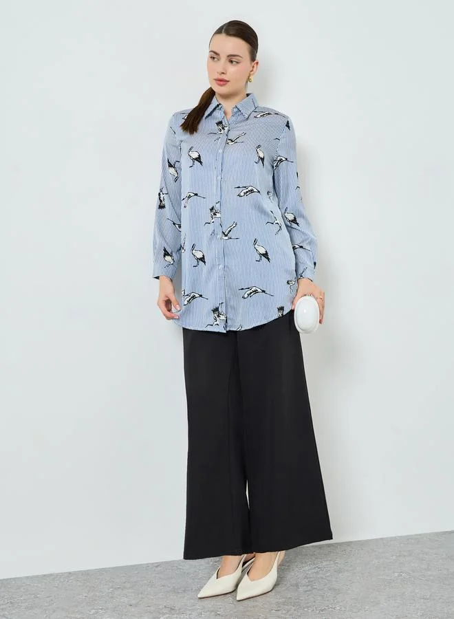 ستايلي قميص أزرق بأكمام طويلة وطبعة طيور